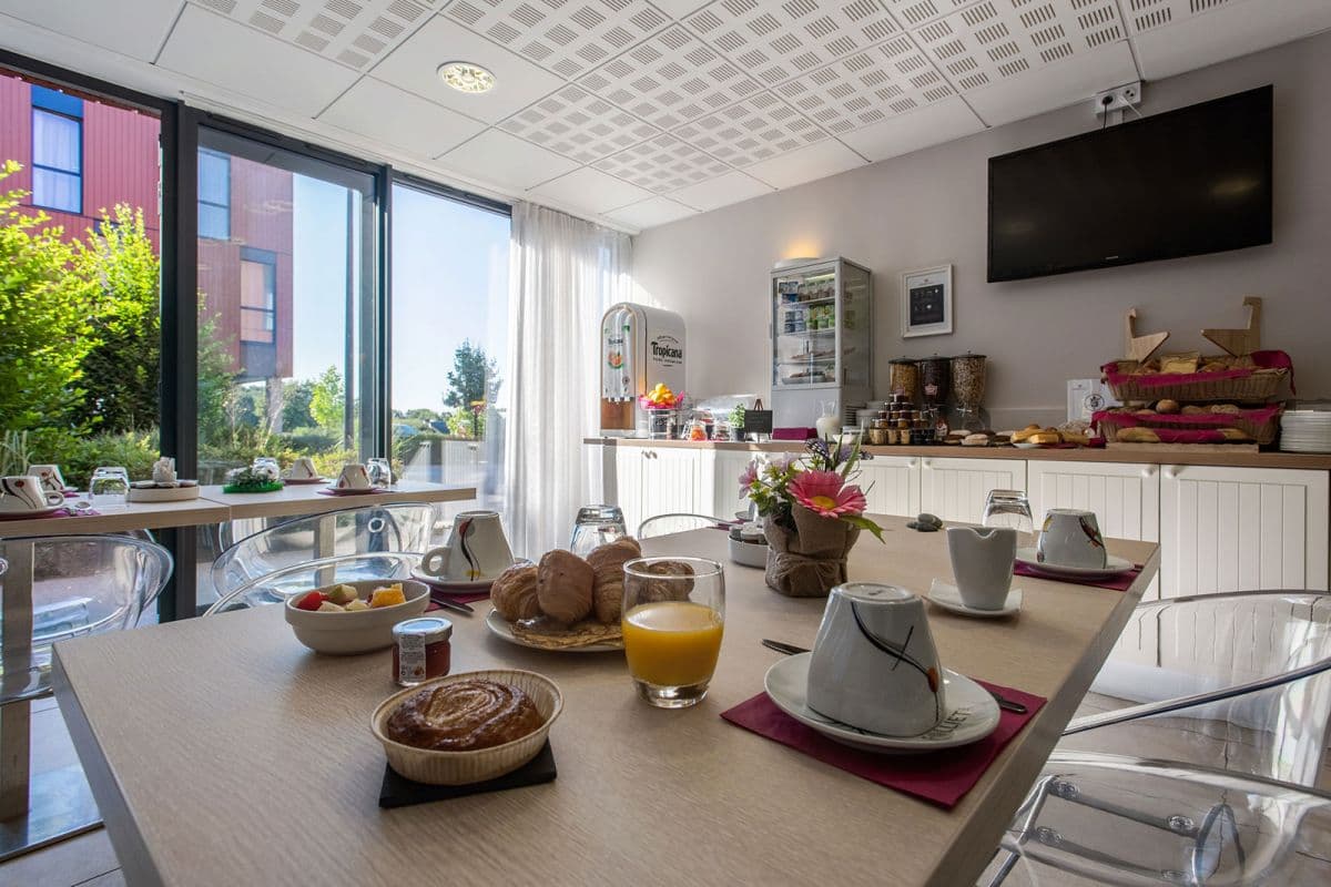 Vannes — Implantée dans le sud-est de Vannes, cette résidence propose des appartements allant du studio au de... - photo 3